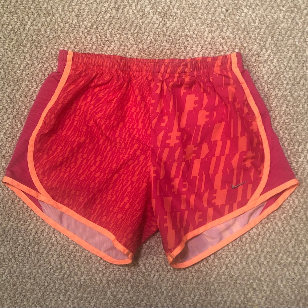 Orange and pink Nike printed girl’s running shorts